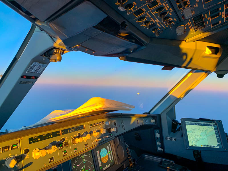 cockpit with paper on glareshield